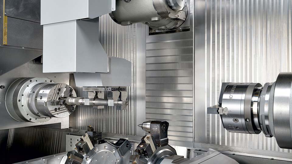 The INDEX G400 YB has a main and counter spindle, a bottom-mounted turret with 10 tool positions and a top-mounted B-axis milling spindle with Y-axis.